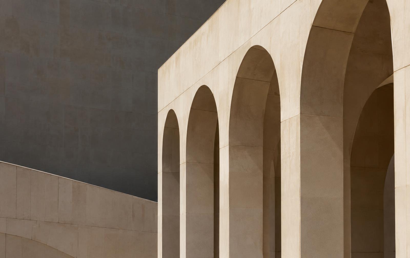 Limestone arches casting deep shadows